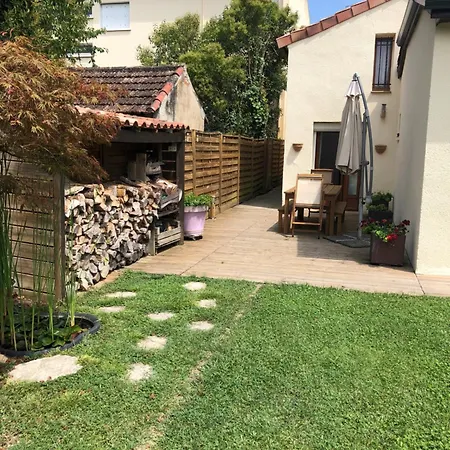 Проживание в семье Escale Au Fond Du Jardin